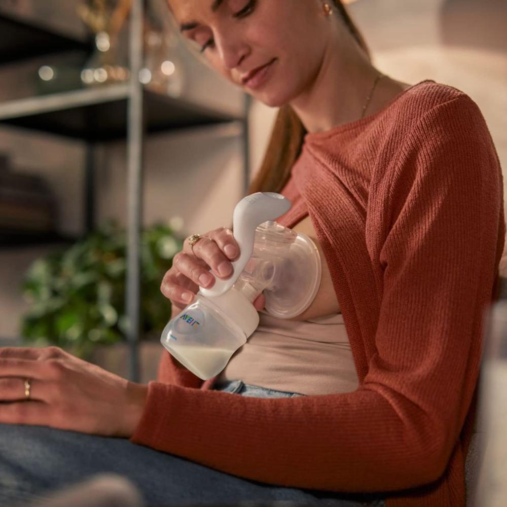 Philips Avent Manual Breast Pump - Soft Cushion Adapts to All Sizes | Combines Suction & Nipple stimulation | SCF430/10