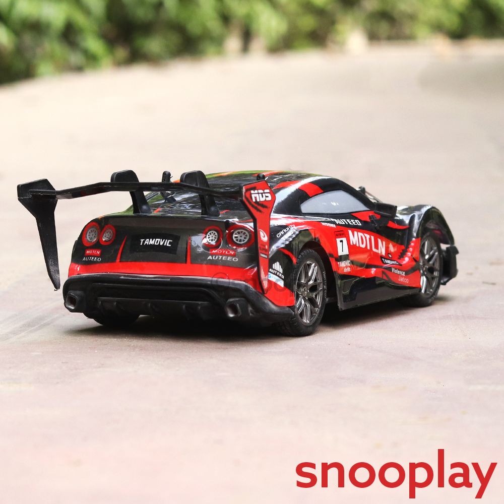 Remote Control 4x4 Drift Racing Car with 4 Spare Wheels - 2.4GHz Frequency, Light & Sound | 1:16 Scale (5-12 Years) | Assorted Colors