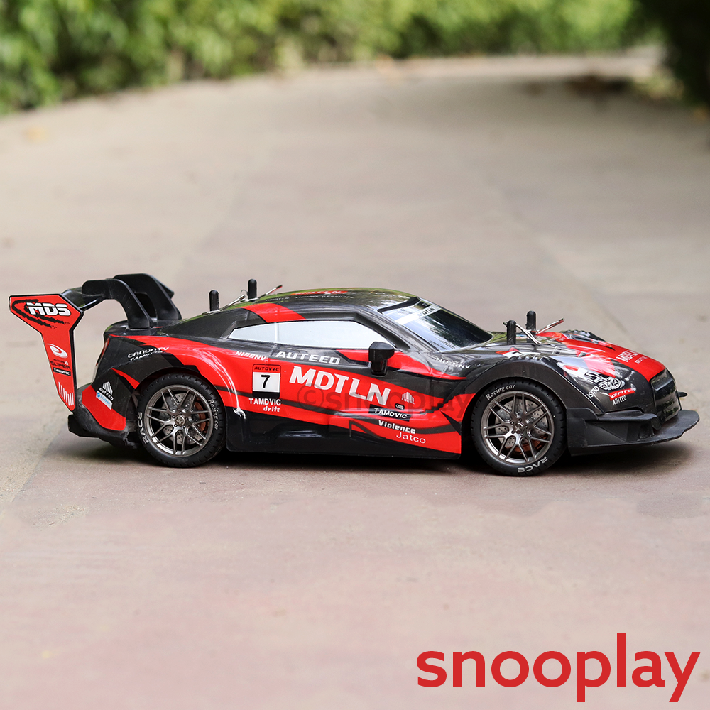 Remote Control 4x4 Drift Racing Car with 4 Spare Wheels - 2.4GHz Frequency, Light & Sound | 1:16 Scale (5-12 Years) | Assorted Colors