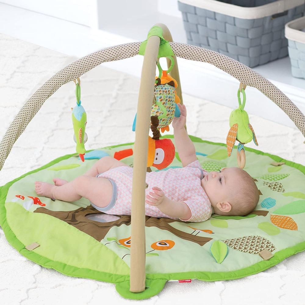 Skip Hop Treetop Friends Baby Activity Gym - Tummy Time, Overhead Play, Playmat | 17 Developmental Activities